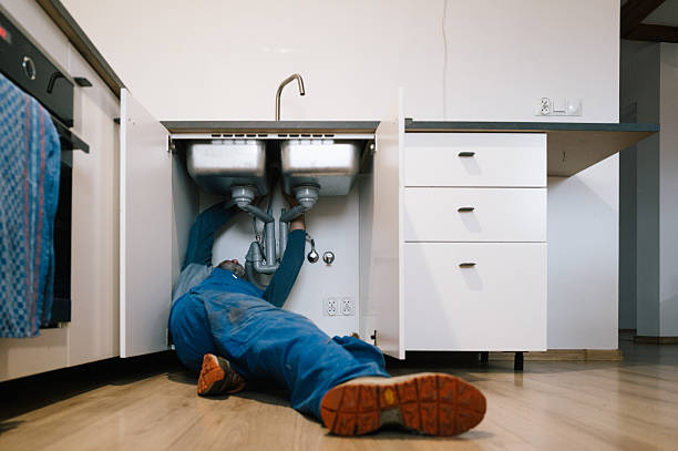 Professional Drain Cleaning technician working in Carlinville, IL